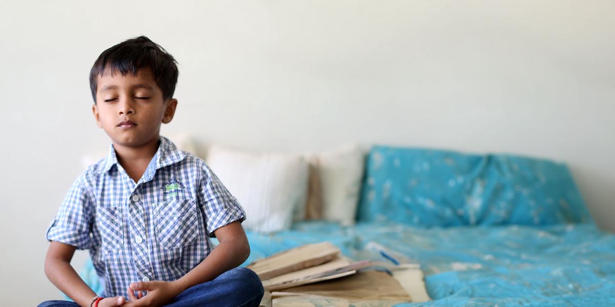 Child doing the daily practice at home
