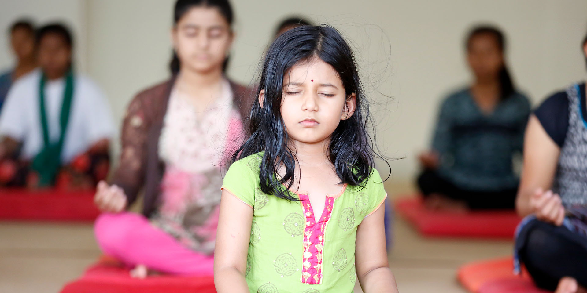 Children practising calming techniques in the Intuition Process